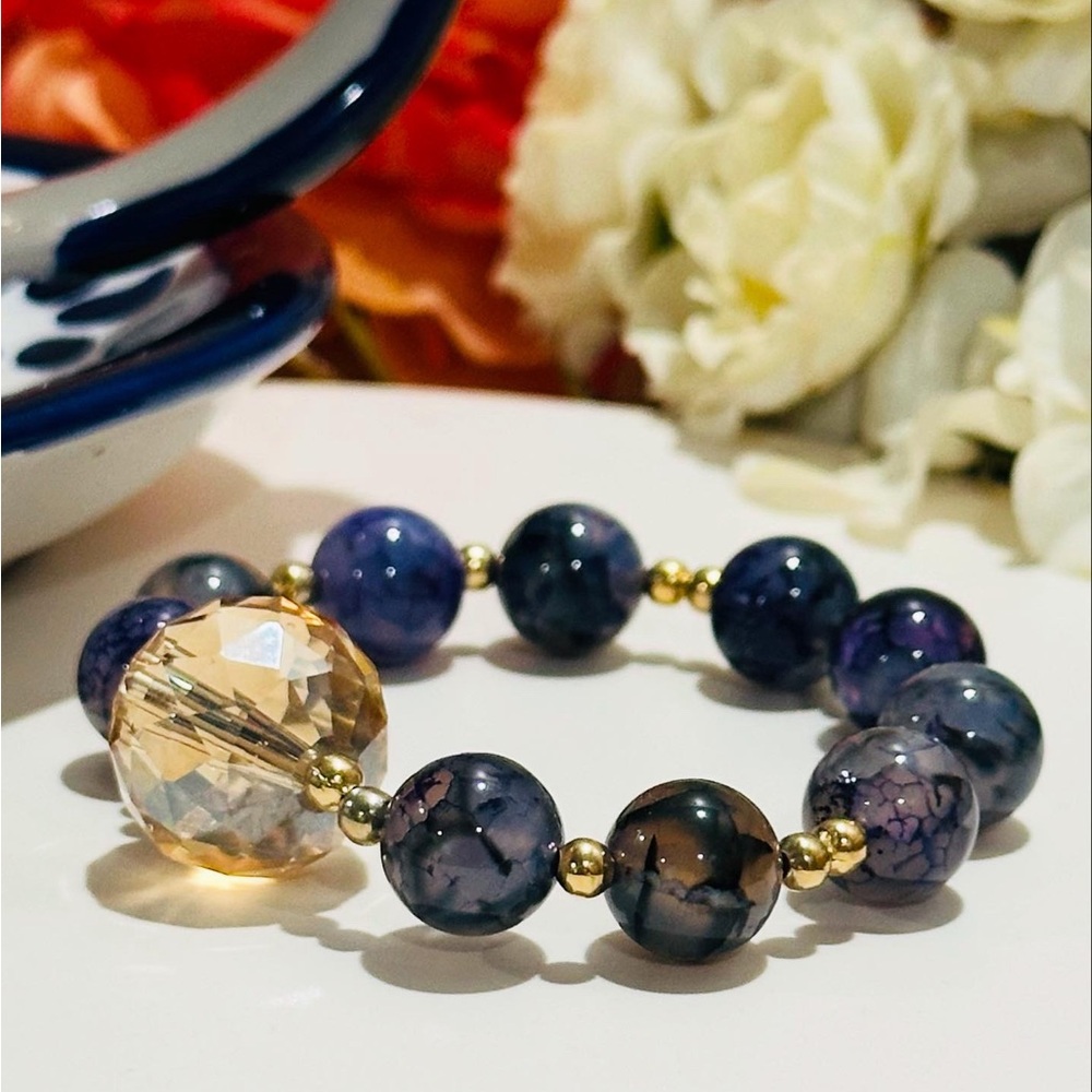 Purple and Gold Beaded Bracelet with Elegant Design